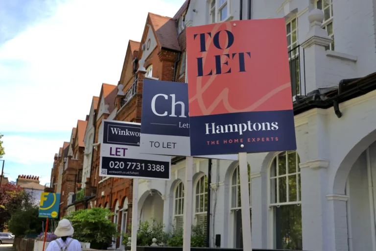 A row of terrace houses in London with 'to let' signs. Rising rents uk rental. Rent control.